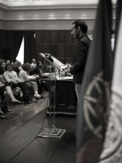 Nour addressing a speech